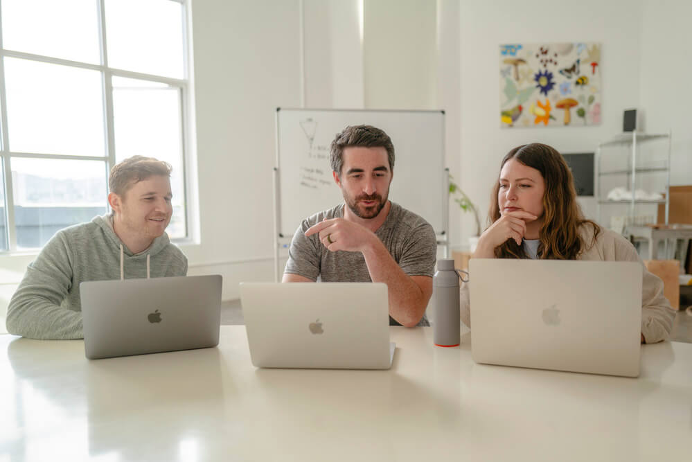 GMP founders Adam, Mark and Hailey discussing AI SEO content strategy